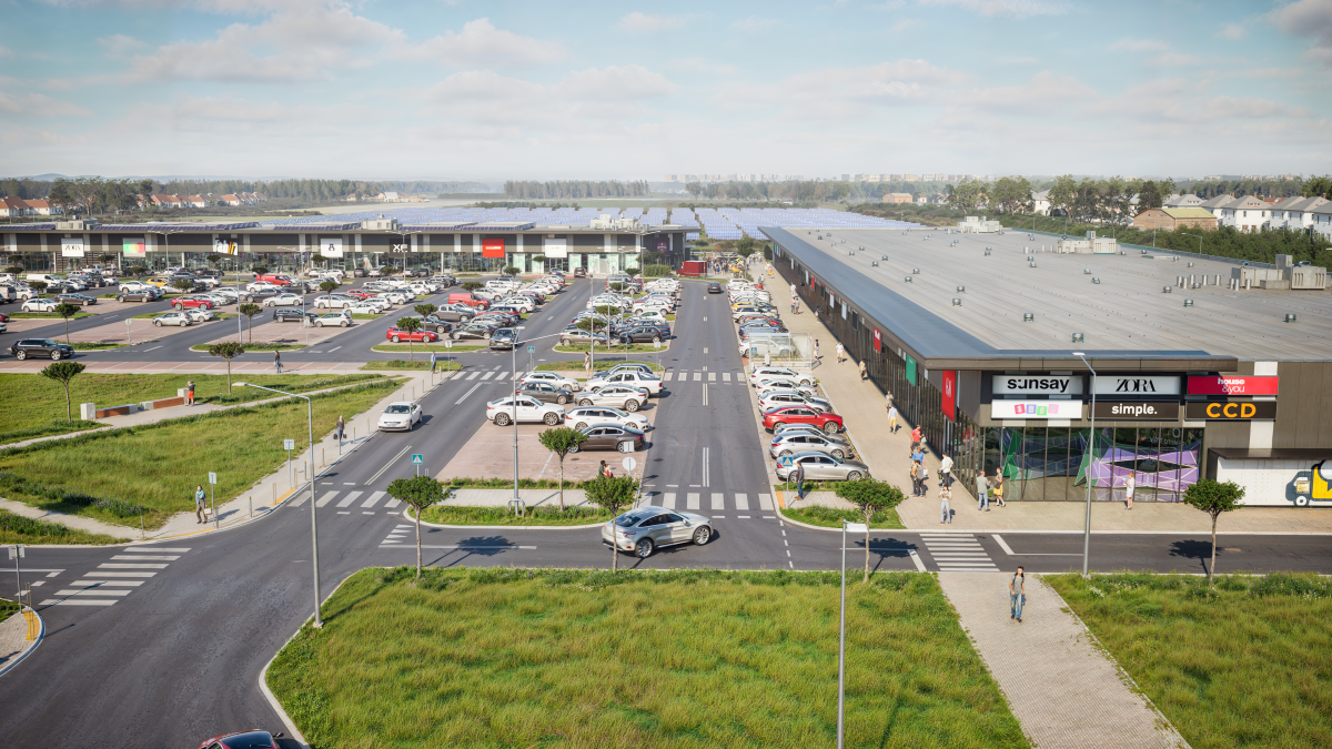 "Zdjęcie przedstawiające wizualizację parku handlowego BIG Konstantynów, który powstaje na granicy Łodzi i Konstantynowa Łódzkiego. Inwestycja o powierzchni 21 tys. m² ma potencjał, aby znacząco zmienić lokalny rynek handlowy. W tle widać dynamiczny rozwój zachodniej części aglomeracji."