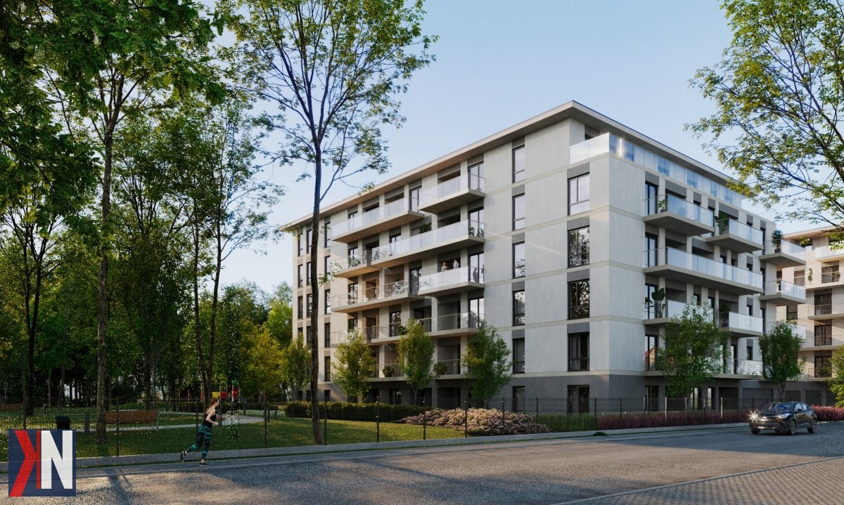 "Zielony projekt Młodzieniaszek Park w Pabianicach przy ul. Szpitalnej 2, pokazujący nowoczesne osiedle mieszkaniowe z własnym parkiem i zapleczem rekreacyjnym, które wyróżnia się na tle standardowych inwestycji."