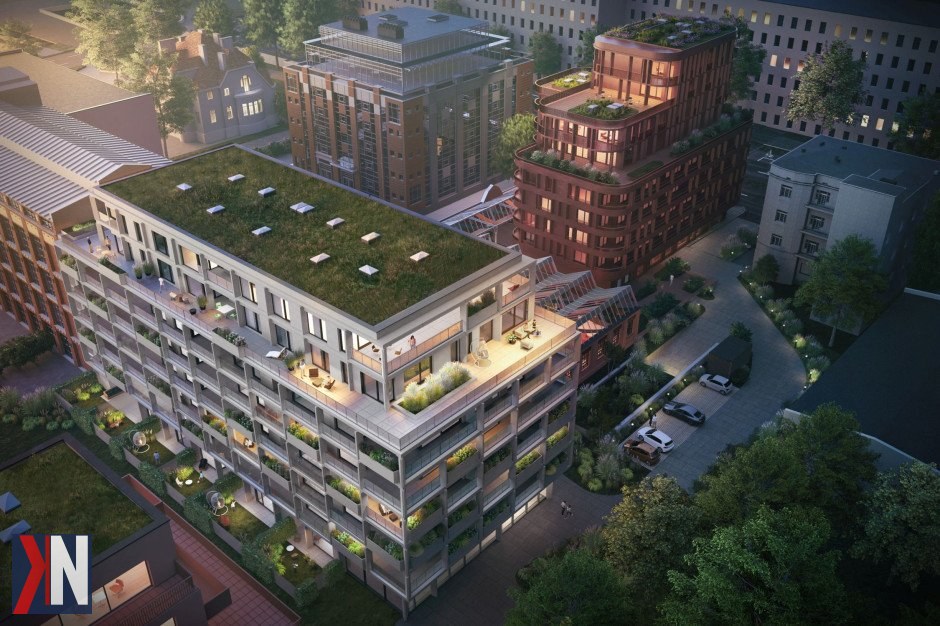 "Rewitalizacja zabytkowej hali w Łodzi z 1911 roku – nowa energia dla centrum miasta. Fotografia przedstawia imponującą architekturę hali, której odnowione elewacje podkreślają historyczny charakter budynku, zapowiadając nowe możliwości dla lokalnej społeczności."